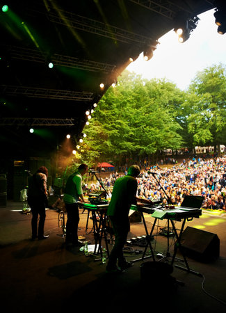 Ready to rock. a musicians feet on stage at an outdoor music festival.の写真素材