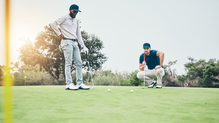 Sports, golf and friends with men on field for relax, hobby and competition match. Thinking, planning and health with males playing together in club for free time, practice and focus on shotの写真素材
