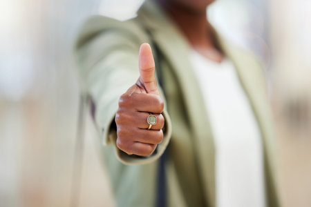 Dont give up on yourself. a woman giving the thumbs up while shopping.
