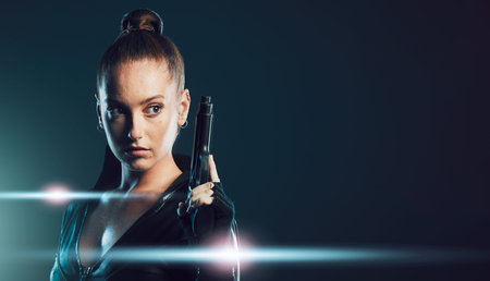 Woman, gun and assassin costume in studio with mock up space for action, movie promo and branding....