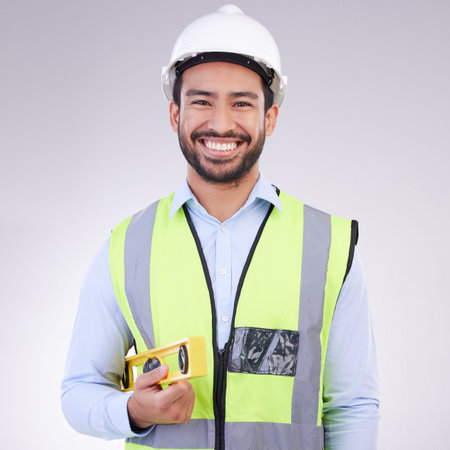 Construction worker in portrait, man with tools and smile, architect or engineer in building...