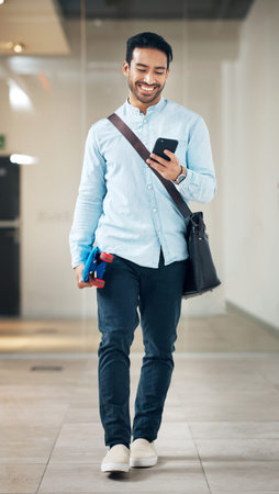 Professional man with smartphone, communication with typing or scroll social media, smile and...