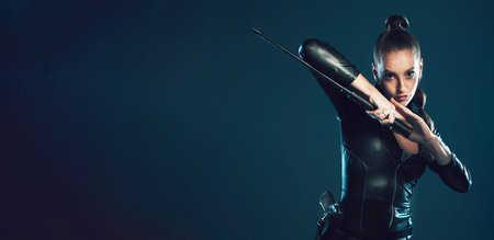 Woman, warrior and vigilante in cosplay with sword on mockup for battle, war or game against dark...