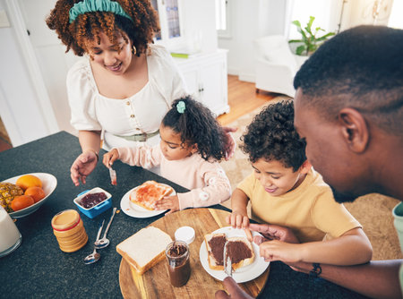 Love, lunch food and black family children, mother and father eating meal, bonding and prepare ingredients. Morning breakfast, kitchen counter or hungry mom, dad and young youth kids excited at homeの写真素材