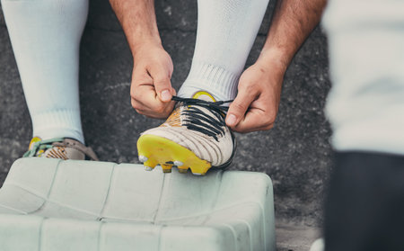 Rugby, tie shoes or sports man ready to start playing a training game for cardio exercise or...