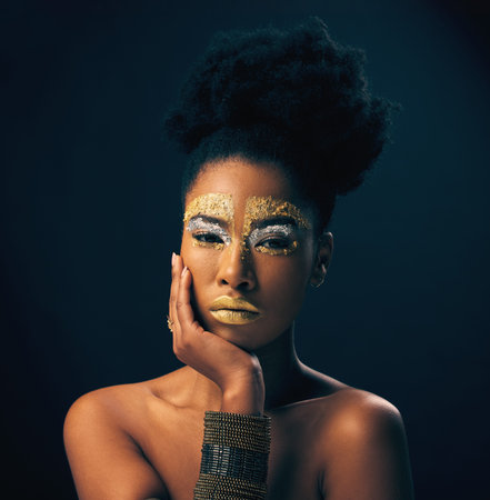 Makeup, gold and glitter with portrait of black woman in studio for luxury, cosmetics and African...