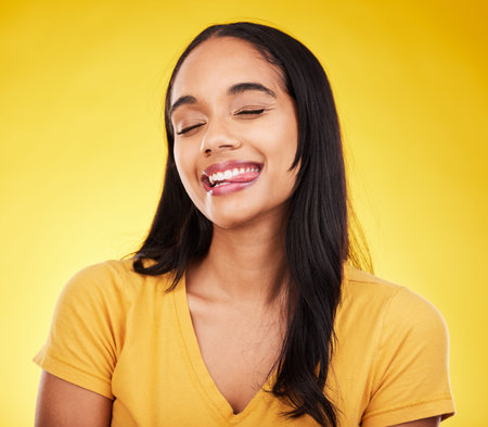 Funny, happy and woman with tongue out, silly and cheerful on studio background. Comic, female and...