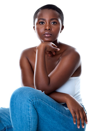 She looks like a natural. Portrait of a beautiful young woman striking a pose against a white background.の写真素材