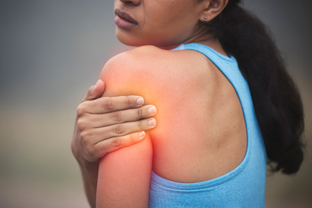 Fitness, arm and woman with shoulder pain injury from workout challenge, sports performance or outdoor exercise. Medical problem, athlete training accident or hurt person with muscle strain emergencyの写真素材