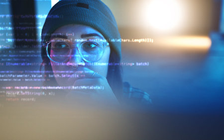 Programmer, code or woman hacker in dark room at night for coding, phishing or cloud computing....