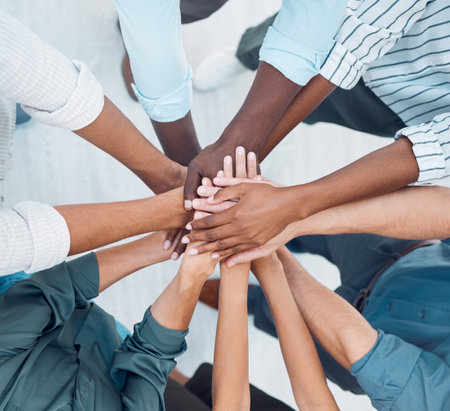 Partnership hands, motivation and team building trust for success, deal and support goals together. Closeup group business people, teamwork and winner achievement celebration, mission and diversityの写真素材