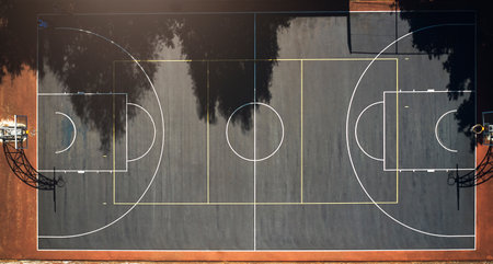 Basketball court, sports background and outdoor community playground for competition, training ground and ball game. Aerial view, outline, net and top floor space of urban performance stadiumの写真素材