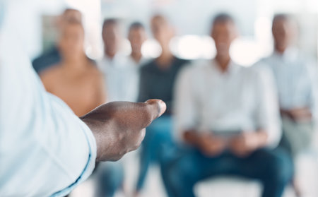 Conference speaker hands, communication and presentation workshop, coaching seminar of audience training, leadership and discussion. Businessman presenter, trade show and speech to convention crowdの写真素材