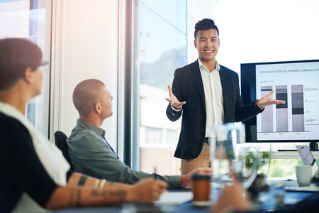 Tell me what you think. a group of businesspeople meeting in the boardroom.