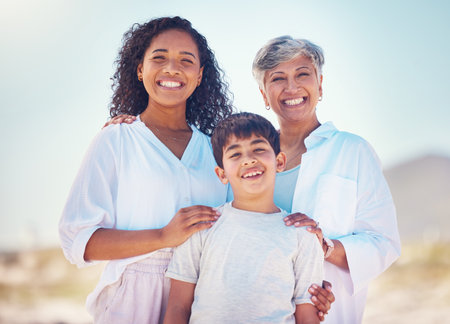 Portrait of mom, grandma and child with smile and happy family bonding together on outdoor vacation. Sun, fun and happiness for mother, old woman and boy on summer holiday travel to relax in Mexico.の写真素材