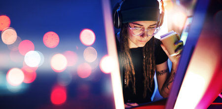 Night, light or woman hacker in dark room coding, phishing or researching blockchain technology mockup. Bokeh, programmer or girl hacking online in digital cybersecurity on a website drinking coffeeの写真素材
