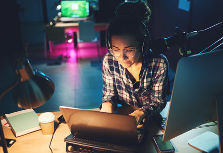 Live streaming, computer and podcast woman typing news article, broadcast report or planning...