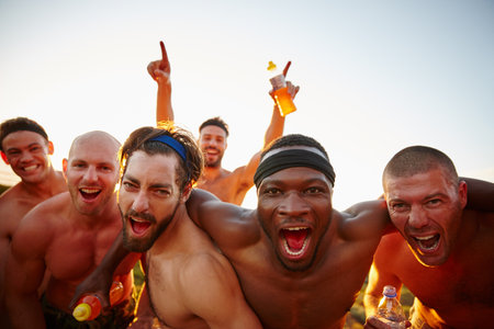 Bring out your inner beast. Cropped portrait of a group of macho male friends shouting in excitement in the outdoors.の写真素材