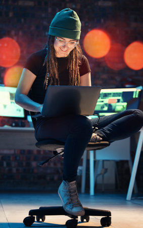Laptop, woman and hacker typing in home for programming, software or cybersecurity. Smile, computer...