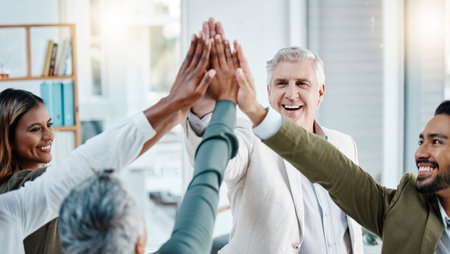 Teamwork, high five and hands of business people in office for motivation, support and success celebration. Collaboration, team building and men and women connect for diversity, goals and partnershipの写真素材