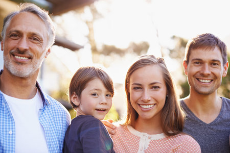 We couldnt do it without granddad. Portrait of a happy family.の写真素材