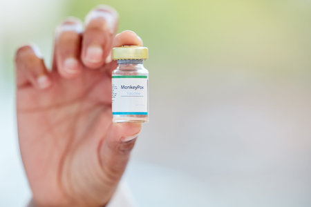 Healthcare, vaccine and hand with monkeypox treatment for cure, breakthrough and innovation on...