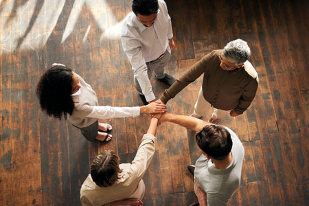 Teamwork, above and people hands stacked for support, collaboration and project mission for business...