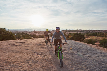 Every day should be an adventure. a young man out mountain biking during the day.の写真素材