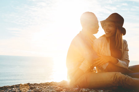 I feel the whole world when Im with you. a happy young couple enjoying a romantic day outdoors.の写真素材