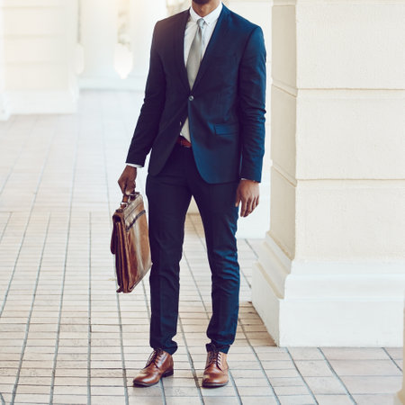 Your style is your brand. a stylishly dressed businessman in the city.の写真素材