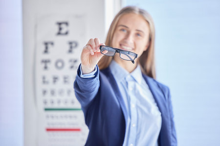 Optometry, vision and portrait of a woman with glasses with prescription lens after a eye test....
