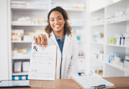 Pharmacy, medicine bag and woman giving package to pov patient in customer services, support or healthcare help desk. Pharmacist or doctor portrait with pharmaceutical note or medical product receiptの写真素材