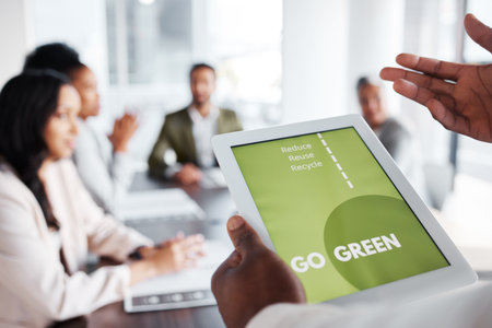 Go green, business meeting and people on tablet screen for sustainable project, eco friendly investment and growth. Paperless or vegan presentation, sustainability and man speaker speaking to clientsの写真素材