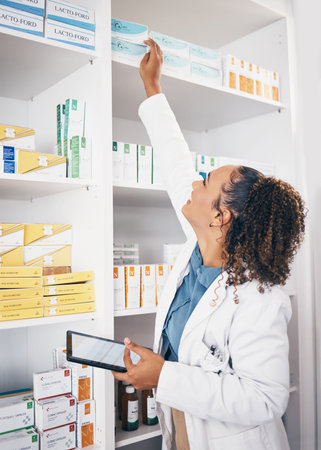 Shelf, pharmacy product and woman with tablet or medicine management, stock research or medical inventory. Digital technology, logistics and medical doctor or pharmacist for pharmaceutical e commerceの写真素材