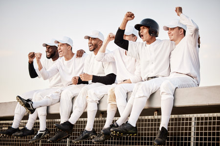 Baseball, team and winner with fist pump and happy men, athlete group and fitness collaboration with achievement. Teamwork, success and sports with excited male players outdoor, winning and championの写真素材