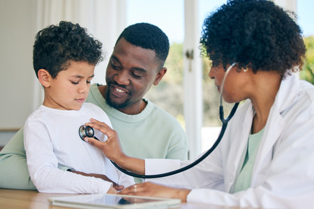 African dad, child and woman doctor with stethoscope in doctors office for health checkup on heart, lungs and breathing. Black man, son and pediatrician in healthcare checking kids asthma symptoms.の写真素材