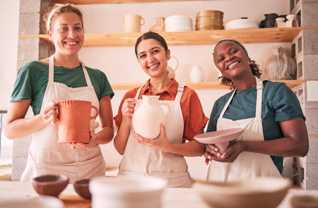 Pottery class portrait, ceramic and women design sculpture mold, manufacturing or art product. Diversity, retail sales store or startup small business owner, artist or happy people in studio workshopの写真素材