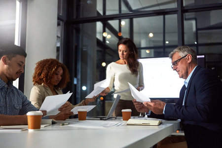 Divide the task, multiply the success. a dedicated businesswoman giving a presentation to her...
