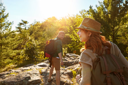 Update your state, not just your status. a young couple out on an adventurous date in the mountains.の写真素材