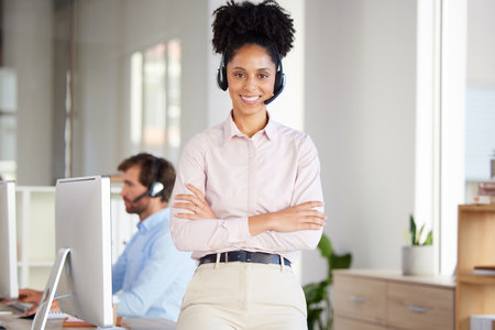 Portrait of black woman, call center and customer service employee working in office of remote online telemarketing business. Proud crm consultant, female digital support and telecommunication workerの写真素材