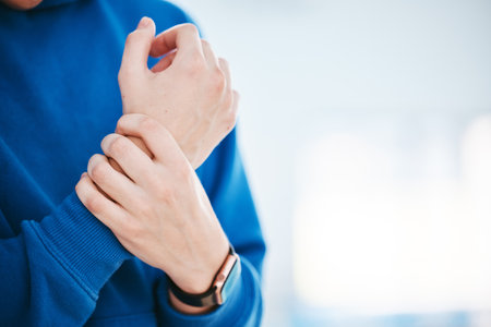 Hands, wrist pain or woman with injury after fitness exercise, sports training or workout accident. Closeup, injured athlete or girl with fibromyalgia, muscle tendinitis or broken bone on mock upの写真素材