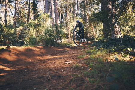 Fitness, bicycle and man outdoor on a hill path with extreme and exercise adventure. Bike, cycling...