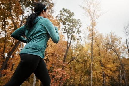Fitness inspired by nature. an attractive young woman going for a run in nature.