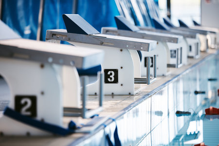 Start, platform and swimming with block at pool for championship, jumping and race. Fitness,...