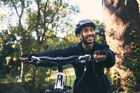 Fitness, bike and Asian man outdoor, exercise and training with workout, practice and wellness. Male...