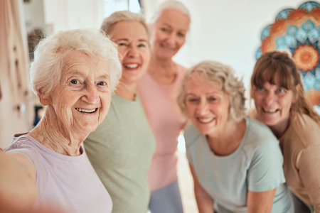 Elderly woman, friends and yoga selfie for healthy wellness, zen or fun spiritual training together at the studio. Portrait of happy senior women with smile for yoga class, photo or social activityの写真素材