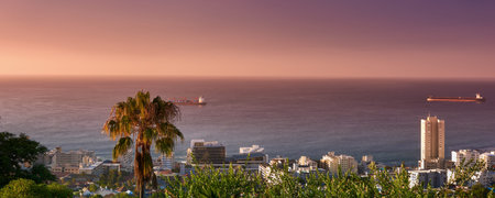 High angle seascape of the ocean and urban buildings on the city beachfront in a tourist holiday...