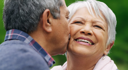 Life is short, fill it with love. a happy senior couple spending a romantic day in the park.の写真素材