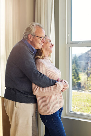 Happy wife means happy life. an affectionate senior married couple spending time together at home.
