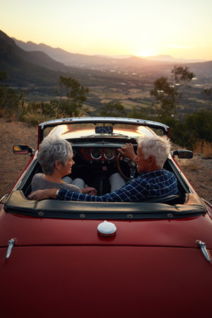 Seeing the places theyve always wanted to see. a senior couple enjoying a road trip.の写真素材